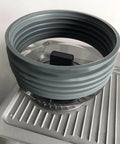 Top Shelf Single Dose Coffee Grinder Bellows Sleeve For Heavy Dust Control In Food Grade Silicone. Grey silicone bellows mounted on grinder.
