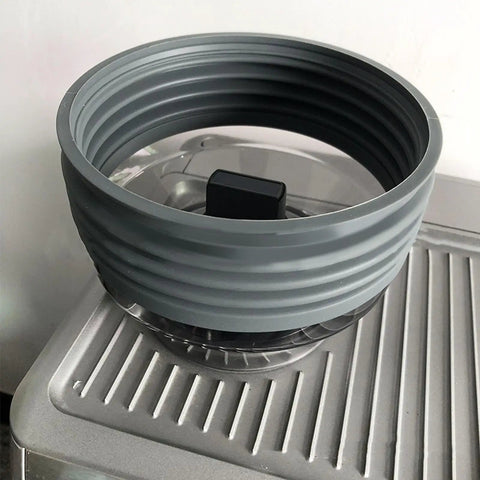Top Shelf Single Dose Coffee Grinder Bellows Sleeve For Heavy Dust Control In Food Grade Silicone. Grey silicone bellows mounted on grinder.