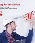 Person installing Two Head LED Emergency Exit Sign Light Kit With Backup Battery, Adjustable Heads, Red Letter on ceiling