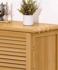 Spacious Six Tier Freestanding Shoe Cabinet Boasting Four Doors And A Nifty Drawer To Stow Away Your Best Kickers In Style top view with plants and decor