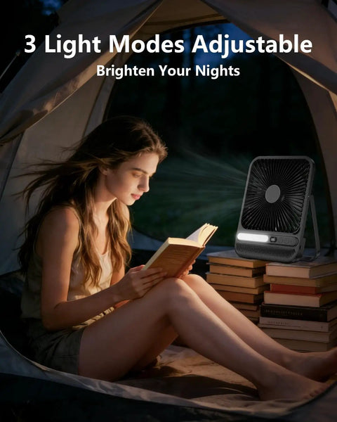 Woman reading in tent with Ultra Thin 7 Inch Portable Travel Fan Must Have With 8000mAh Battery, 28 Hours Runtime, Quiet Rechargeable Desk Fan