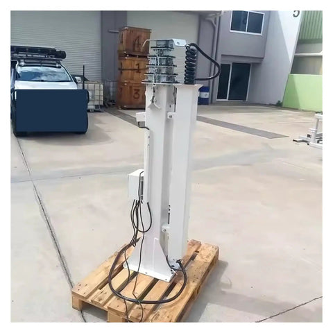 Electric Hydraulic Telescopic Mast Aluminum Push Up Antenna Pole on wooden pallet, showcasing base and control wiring.