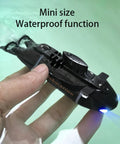 Mini RC Submarine For Kids With 6CH Remote Control, Totally Cool High Speed Waterproof Diving Toy For Pools, Lakes, And Bathtubs, Easy To Control With 2.4GHz Wireless Tech And Front Navigation Lights, Ideal Gift For Boys And Girls Black held in a hand above water.