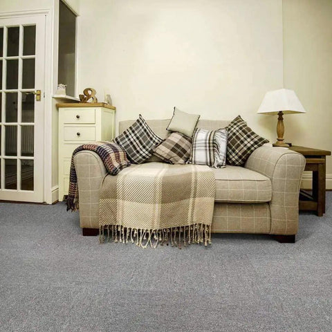 Living room with sofa on 20 Pack Commercial Carpet Tiles 20x20 Inches Reusable Carpet Squares with Stickers PVC Backed Floor Tiles