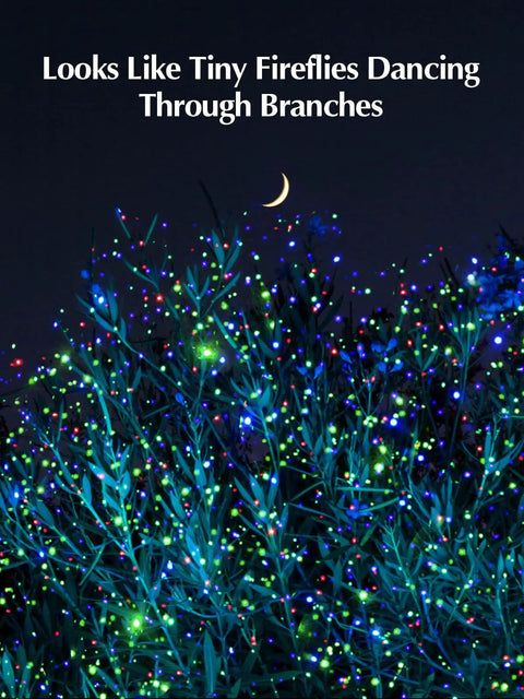 Galaxy Star Projector 5 In 1 With Bluetooth Speaker Remote Timer White Noise 14 Color LED Night Lights illuminating branches.