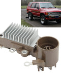 Solid As A Rock Alternator Rebuild Kit For Pickup Trucks With 2.4L Inline Four Engine 1985 Through 1991 Grease Monkey Approved Voltage Regulator close-up, aluminum cooling fins.