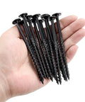 Person holding Heavy Duty Exterior Wood Screws No 14 X 4 Inch, 50 Piece Set With Self Drilling Tips And Serrated Threads