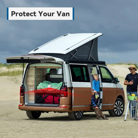 Van on a beach with open trunk, showcasing the 125dB Motion Sensor Alarm With Remote, ideal for van security and peace of mind protection.