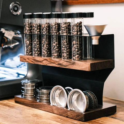 Two Tier Wooden Coffee Bean Storage Rack With Airtight Glass Jars Featuring Black Vent Lids Countertop Flex Freshness Sealer Brew Day Ready Kitchen Organization Set Keep Beans Crisp on wooden surface.
