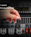Hand adjusting EQ sliders on 6 Channel DJ Audio Mixer With 99 DSP Effects And 7 Band EQ Gig Ready Independent 48V Phantom Power Bluetooth