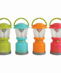 Kids Adventure Mini LED Lantern For Outdoor Fun in green, blue, orange, and red, kid friendly handheld light with 5 LEDs, IPX4 water resistant.