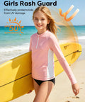 Girl wearing Girls Rash Guard Zip Up Long Sleeve UPF 50 Plus Sun Protection Shirt Quick Dry Breathable Athletic Top Loose Fit Soft Polyester for beach and surf