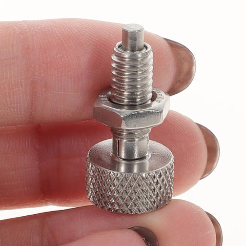 Heavy Duty Stainless Steel Spring Plungers Two Pack With Knurled Handle For Quick Snap Locking No Sweat Self Retracting Pins That Grip Tight For Toolboxes Molds And Tough Job Site Projects shown held in hand.