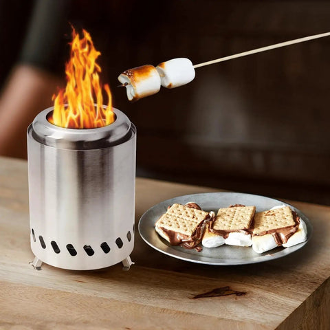 Smokeless Tabletop Fire Pit For Outdoor Use with roasted marshmallow and s'mores on plate, portable mini fire pit stove