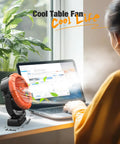 Portable Misting Clip On Fan With 100ml Water Tank cooling workspace, LED light and mist next to laptop in sunlight.