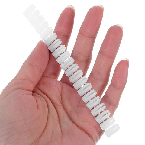 Hand holding Heavy Duty Drywall Anchors Kit 300 Pcs Plastic Wall Expansion Anchors for Furniture, Shelves, and Home Use