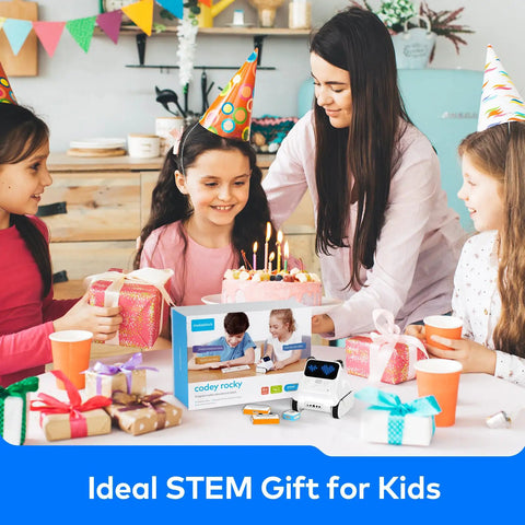 Codey Rocky Interactive Coding Robot For Kids Aged 6 To 12, Beginner Friendly Remote Control Toy That Sparks Problem Solving, Logic, And Coding Fun Totally Dope Right Out Of The Box. Kids birthday party with white robot and box