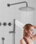 Shower System Wall Mounted 10 Inch Stainless Steel Rain Shower with overhead rain flow and handheld spray feature in use.