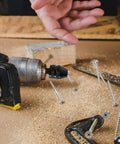 Keyless Drill Chuck Adapters Set 0.8 to 8 mm and 0.3 to 3.6 mm attached to drill with wood and screws in workshop setting