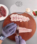 Person using Pro Chef Cut Resistant Kitchen Gloves EN388 Level 5, Food Grade Safety Gloves, Violet Medium while filleting fish