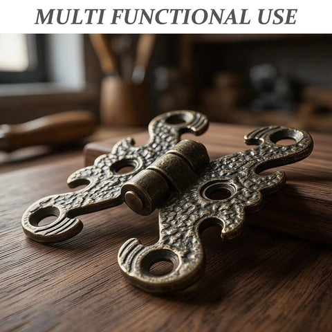 Close-up of Vintage H Shape Zinc Alloy Hinges for small cabinets and gift boxes, bronze finish with filigree edges.