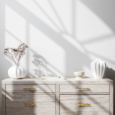 Modern dresser with 30 Pack Brushed Brass Cabinet Handles 3 Inch Modern Square Drawer Pulls, gold finish against neutral decor backdrop.
