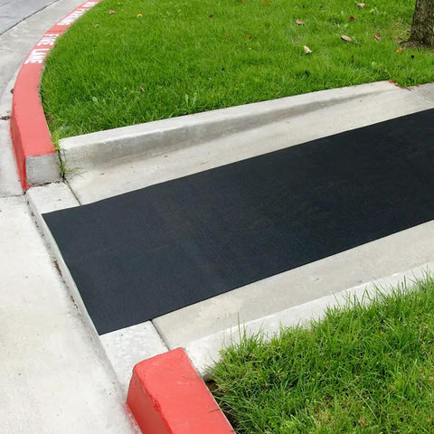 Non Slip Outdoor Rubber Ramp Cleat Floor Mat For Inclined Walkways One Eighth Inch Thick 3 Ft By 4 Ft in outdoor setting.