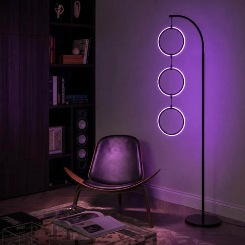 Dope RGB Color Changing Floor Lamp With Arching Three-Ring Pendant, modern corner standing light, purple LED glow in living room.