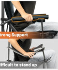 Oversized Folding Camping Chair With High Back Support 500 Lbs Capacity showing strong armrest support and difficulty standing