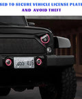 Heavy Duty Anti Theft License Plate Screw Kit securing a vehicle license plate on a black off-road truck.