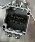 Inside view of Heavy Duty Metal Conduit Connectors 5 Pack Double Outlet Wire Harness Clamps 3/8 Inch Cables showing terminal block.