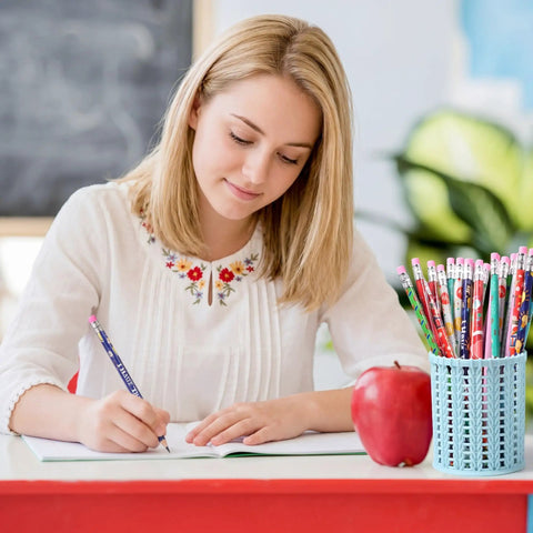 Student writing with 48 Pack Science Pencils Bulk With Erasers And Motivational Sayings For Lab Week Parties And Classroom Rewards