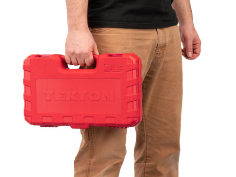 Person holding red case of Half Inch Drive Deep Impact Socket Set With Case, 14-Piece Metric 27-39mm, for axle nuts