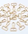 Hella Sturdy 15 Pack Solid Zinc Alloy D Ring Swivel Lobster Claw Clasp Hardware for Crafting Lanyards Bag Straps and Outdoor Gear Attachments Anti Rust Gold Finish, trigger clips arranged in a circular layout.