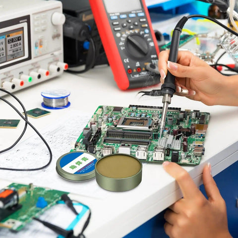 Person using soldering iron on circuit board with No Clean Solder Flux Paste For Electronics Repair And PCB Soldering Pro Grade Flux Cream