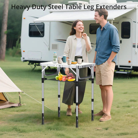 Knockout Black Table Leg Extenders And Adjustable Height Risers For Folding Tables set up outdoors with fruits and drinks on a table.