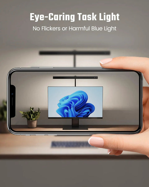 Person demonstrating no flicker LED Desk Lamp For Office And Home with phone, showing glare-free light on screen.