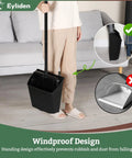 Person using Large Upright Commercial Dustpan With Comb Teeth For Hair And Debris Cleanup; windproof design demonstration.
