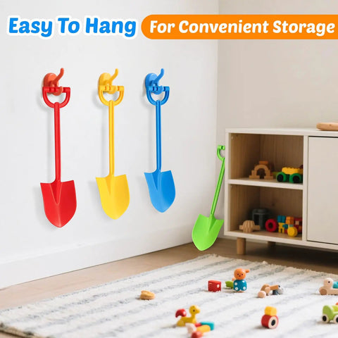 Four colorful 15-inch plastic shovels hanging for storage; 4 Piece 15 Inch Beach Sand Shovel Set for Kids, Colorful Outdoor Digging Toys.