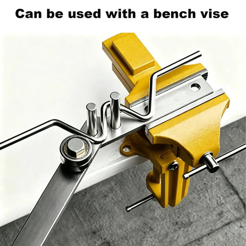 Solid As A Rock Manual Rebar Bender And Compact Pipe Wire Shaping Tool attached to a bench vise for shaping metal rods.