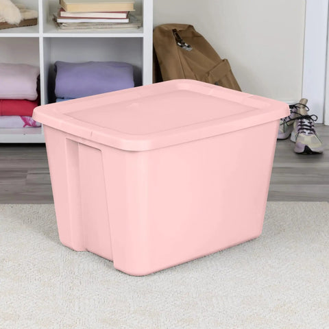 Pink 18 Gallon Storage Bin With Secure Snap On Lid Heavy Duty Stackable Plastic Tote Clutch For Moving Essentials And Home Organization Space Flex Game Changer in a room setting.