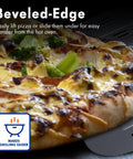 Perforated 12 Inch Metal Pizza Peel With Long Handle Non Stick Aluminum Paddle holding pizza in outdoor oven setting.