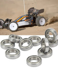 10 Pack RC Ball Bearings Kit For 1 By 10 And 1 By 8 Remote Control Cars, Steel Shielded Bearings in front of RC car on sandy track