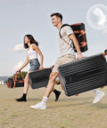 Couple carrying 3 Piece Travel Luggage Set With Lightweight Hardshell Suitcases And Dual Spinner Wheels TSA Locks 20 Inch Carry On