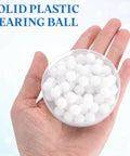 Three Eighths Inch POM Bearing Balls 50 Pack Solid Plastic Precision Balls For Drawer Sliders And Table Rollers Pro Grade Durable DIY Friendly Hardware And Industrial Projects, white balls in a hand