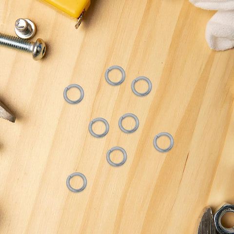 Heavy Duty Steel Split Lock Washers Stainless M6 Fastener Hardware 300 Pack on a wooden surface for engine work.