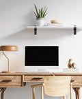Tough As Nails Heavy Duty Floating Shelf Brackets Set Of Four Adjusts Securely To Glass And Wood Supports 25 Pounds Per Pair Premium Zinc Alloy With Polished Chrome Finish For Bathroom Remodels on a modern desk setup.