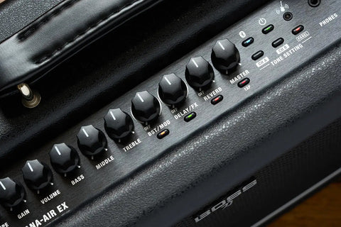 Close-up of control panel on powerful wireless desktop amplifier for guitar and bass with dual five inch speakers delivers rich stereo tone