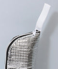 Insulated Bottle Cooler Bag and Thermal Tote with Triple Layer Insulation to Keep Your Morning Sips Frosty or Steaming Hot for Hours while Blocking Moisture and Drip Drama on the Go, silver insulated material close-up.