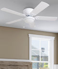 52 Inch Indoor Ceiling Fan With Light And LED Flush Mount 5 Blade Style in white installed in large room with window view.